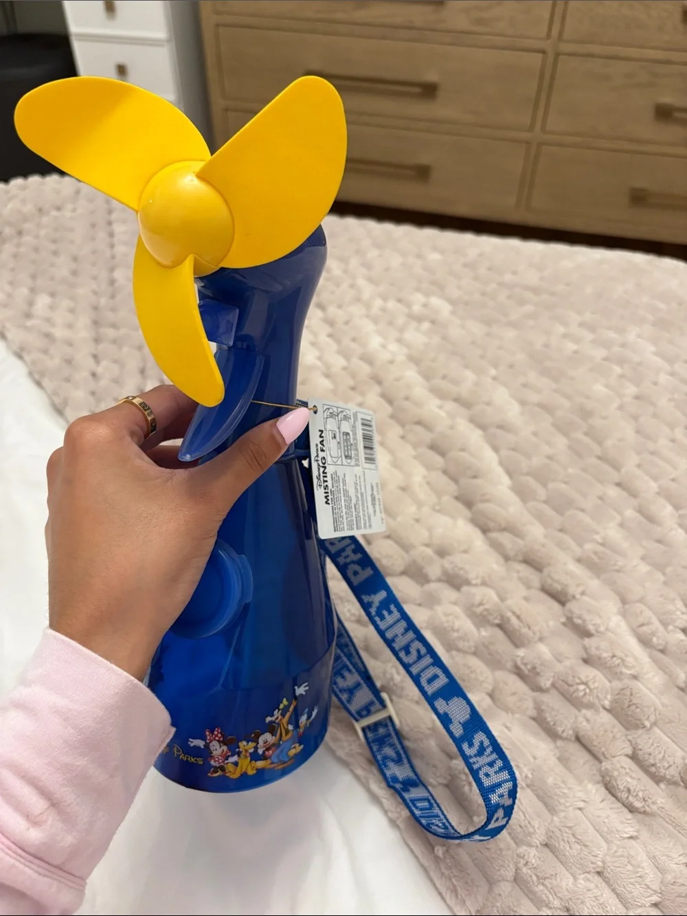 Discontinued Disney Blue Handheld Fan with Yellow Blades and Character Strap